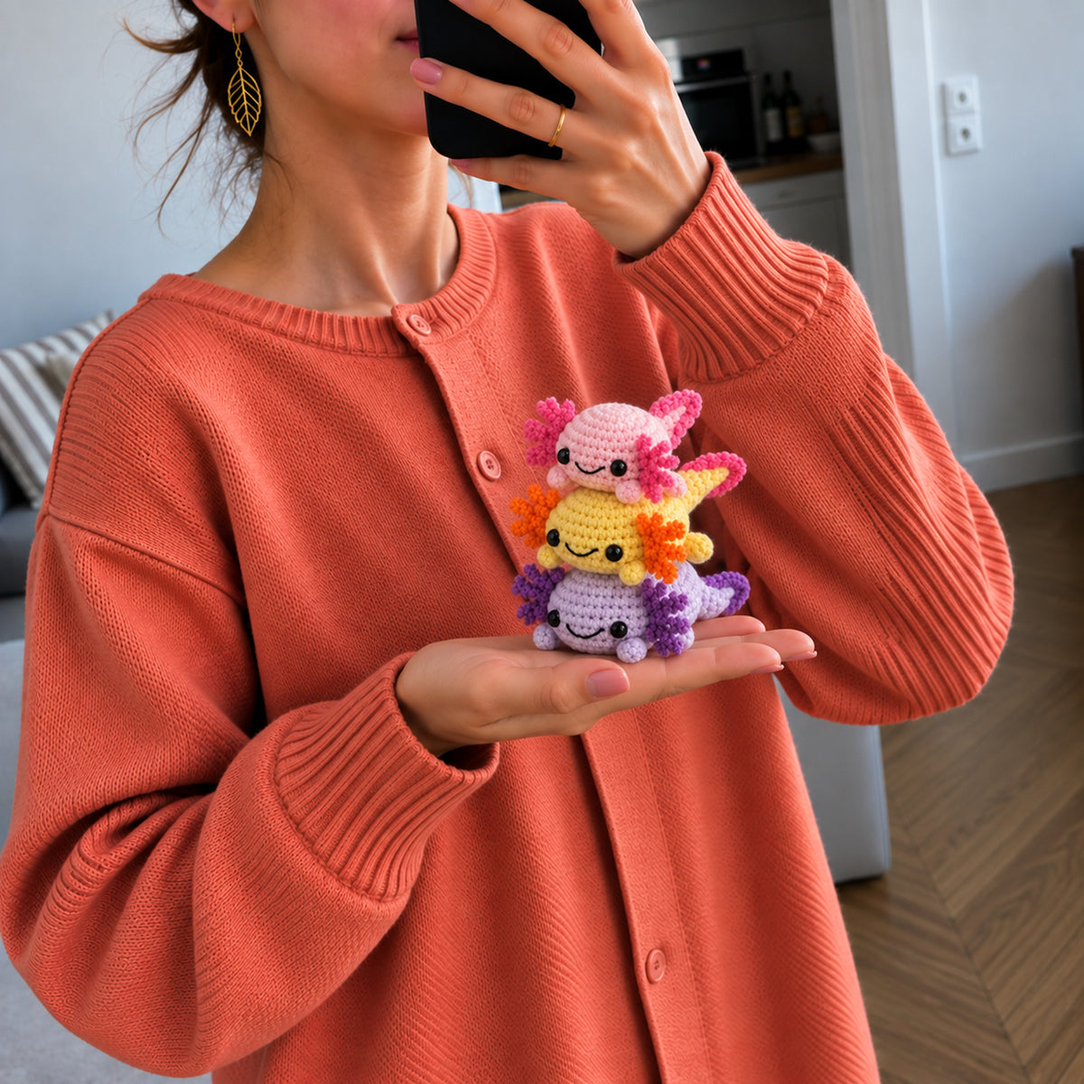 Sorbet Axolotl Trio: pink, lilac and yellow axolotls with tiny frilly gills, shown in hand