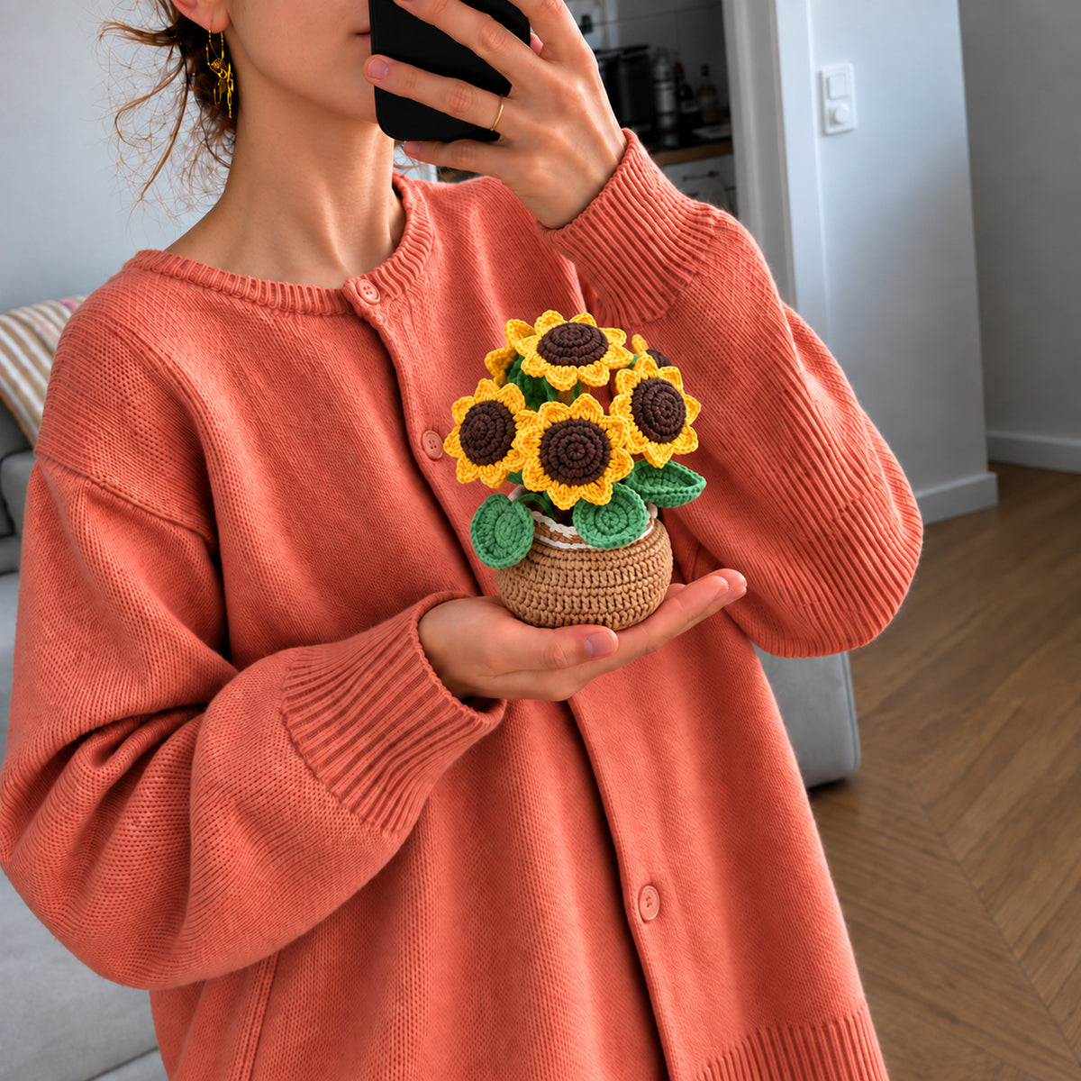 Sunflower Basket: bright sunflowers gathered in a small brown basket, shown in hand