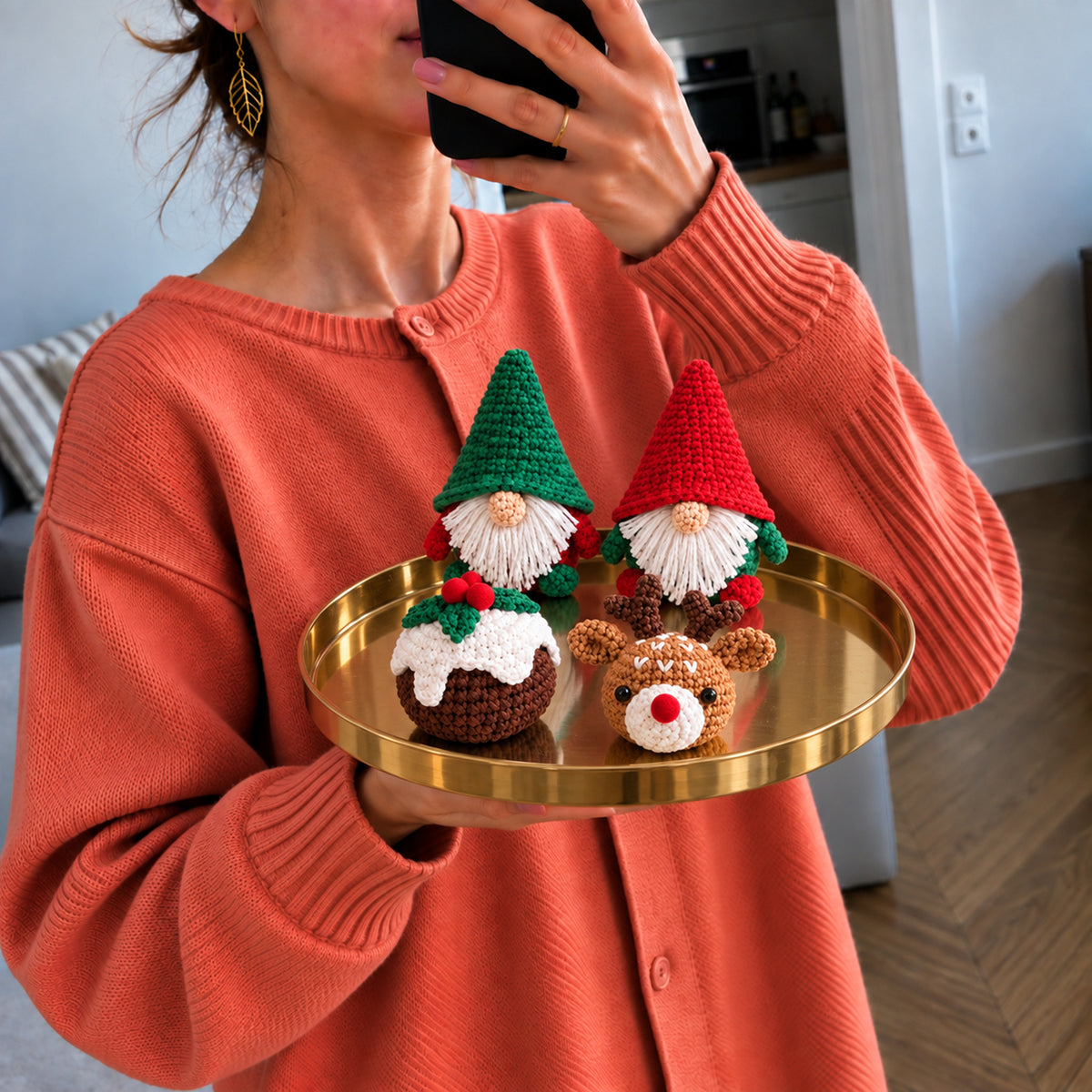 Winter Gnome Gathering: winter gnomes beside pudding and reindeer designs, shown in hand
