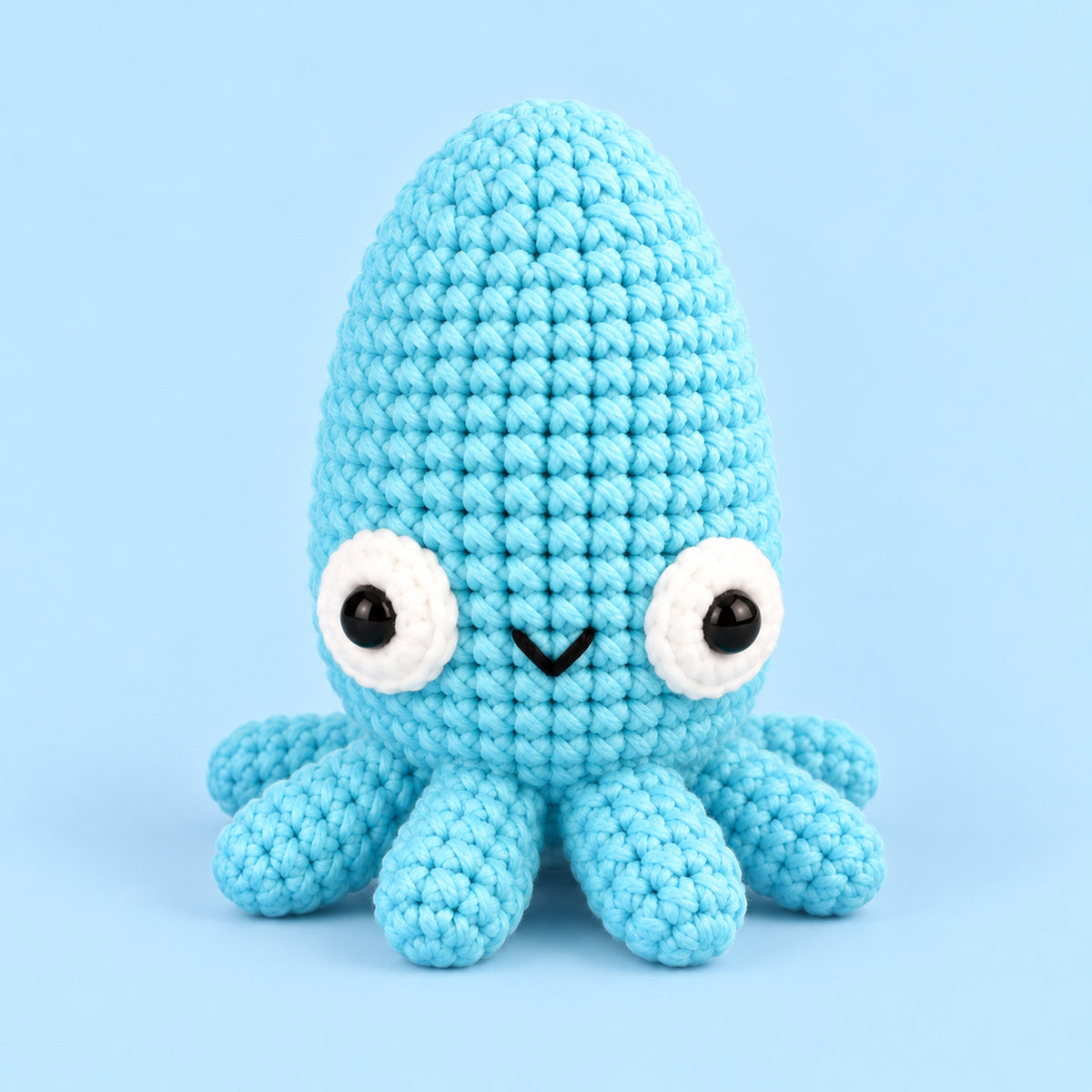 Blue Tide Cuttlefish: a sky blue cuttlefish with a rounded head and smiling face