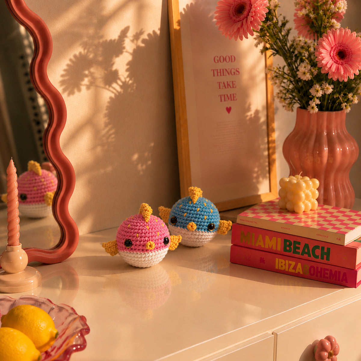 Bubble Bay Pufferfish: pink and blue pufferfish, displayed in an interior setting