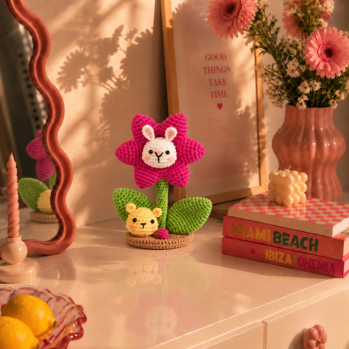 Bunny Bloom: a pink bunny-faced flower with a tiny bear detail, displayed in an interior setting