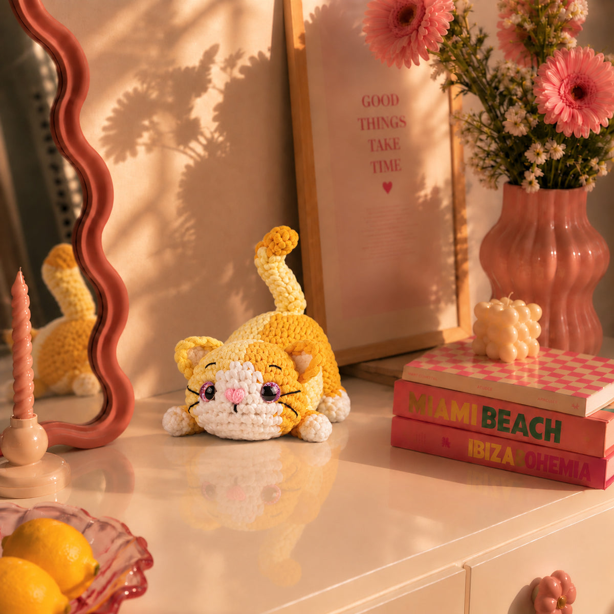 Buttercup Stretch Cat: a yellow striped cat stretching its paws and curling its tail, displayed in an interior setting