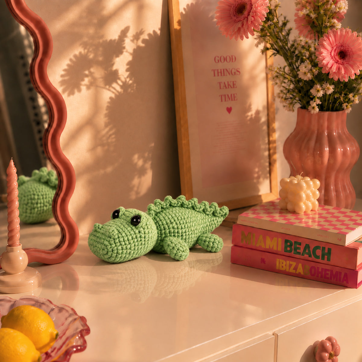Clover Crocodile: a green crocodile with a rounded snout and a row of small back scales, displayed in an interior setting