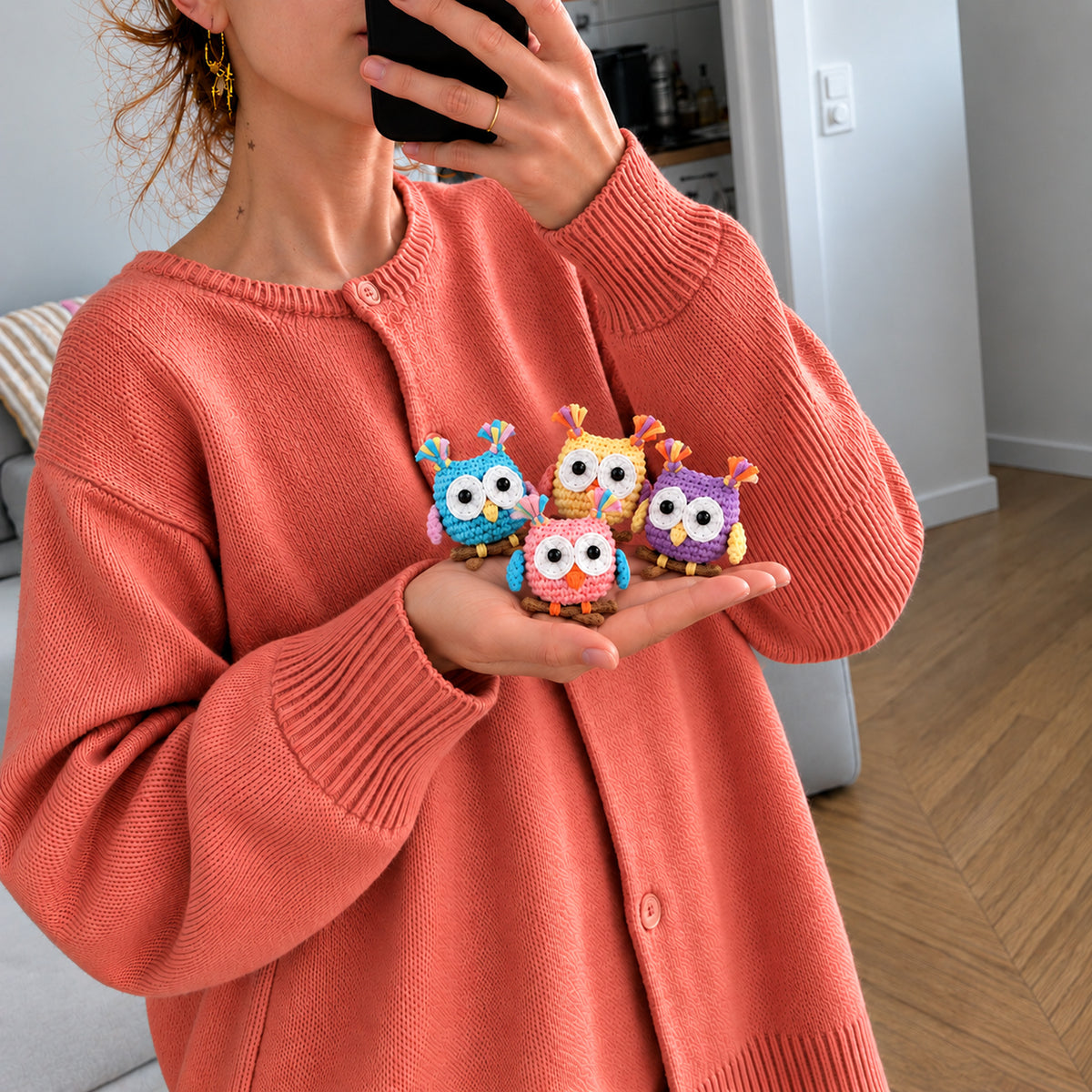 Confetti Owl Crew: colourful mini owls with bright eyes and tiny party details, shown in hand