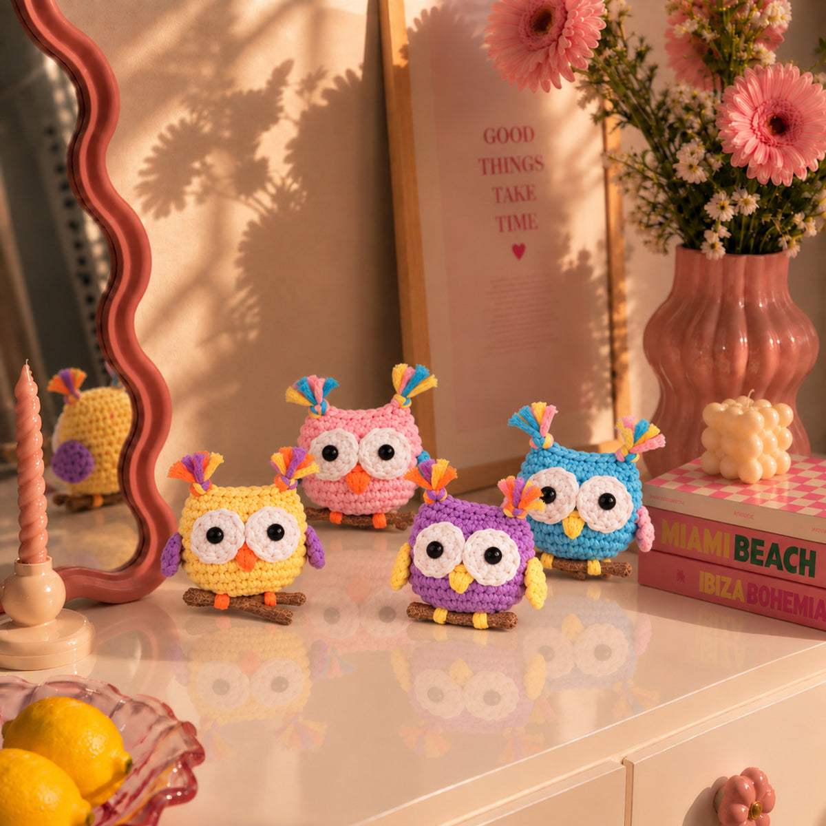 Confetti Owl Crew: colourful mini owls with bright eyes and tiny party details, displayed in an interior setting