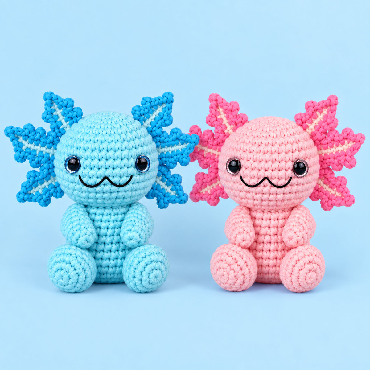 Cotton Candy Axolotls: pink and blue axolotls with delicate frilly gills