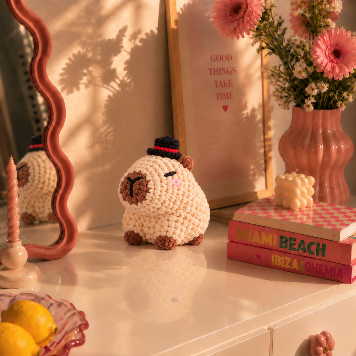 Dapper Capybara: a cream capybara wearing a small black hat, displayed in an interior setting