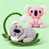 Dreamy Koala Pals: a grey koala resting in a curved branch beside a pink koala
