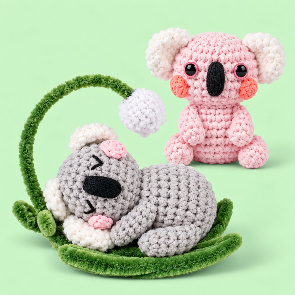 Dreamy Koala Pals: a grey koala resting in a curved branch beside a pink koala
