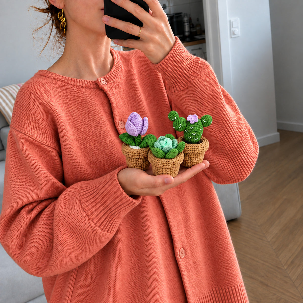 Little Greenhouse Trio: a potted tulip, cactus and succulent, shown in hand