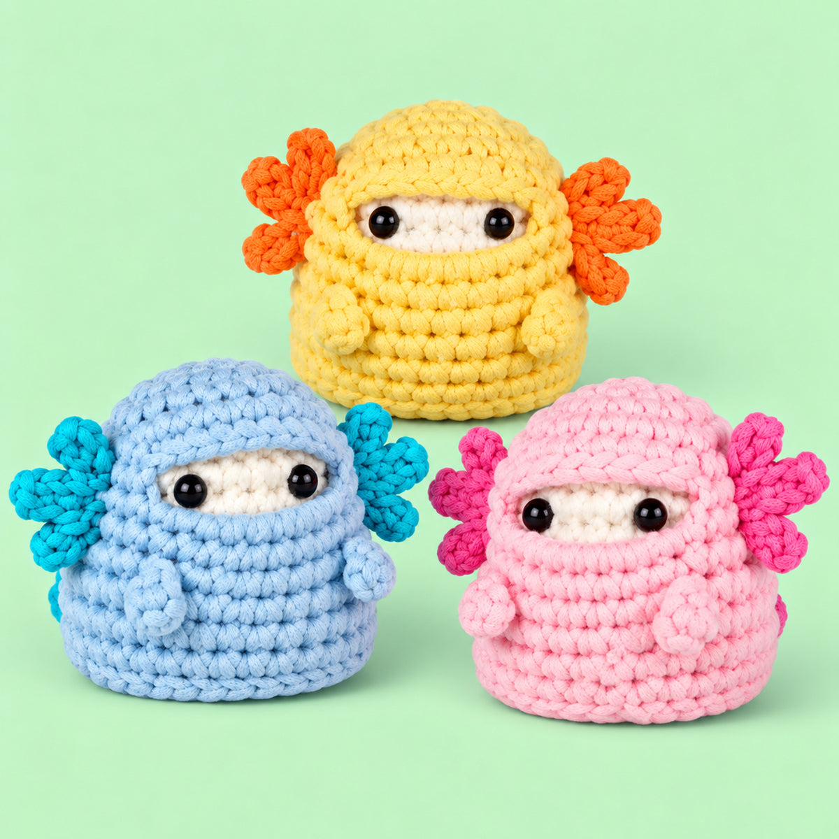 Marshmallow Axolotl Crew: blue, yellow and pink axolotls