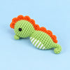 Meadow Seahorse: a green seahorse with an orange crest and curved tail