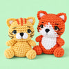 Pocket Fox and Cat: an orange fox and a golden cat with small embroidered details