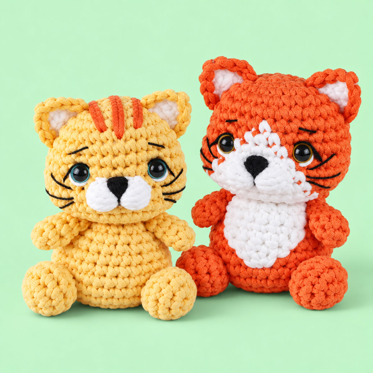 Pocket Fox and Cat: an orange fox and a golden cat with small embroidered details