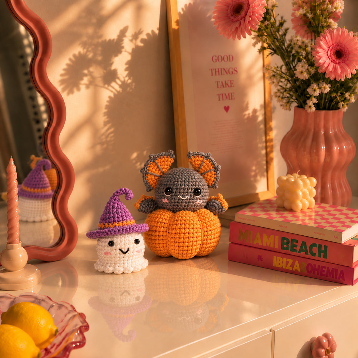 Pumpkin Moon Friends: a grey bat peeking from a pumpkin alongside a little witch ghost, displayed in an interior setting