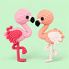 Rosy Lagoon Flamingos: pink and peach flamingos with curved necks and delicate legs