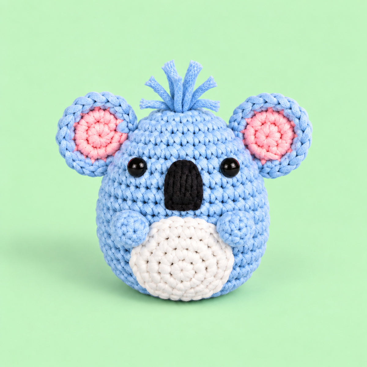 Sky Blue Koala: a sky blue koala face with pink ears and a little tuft on top
