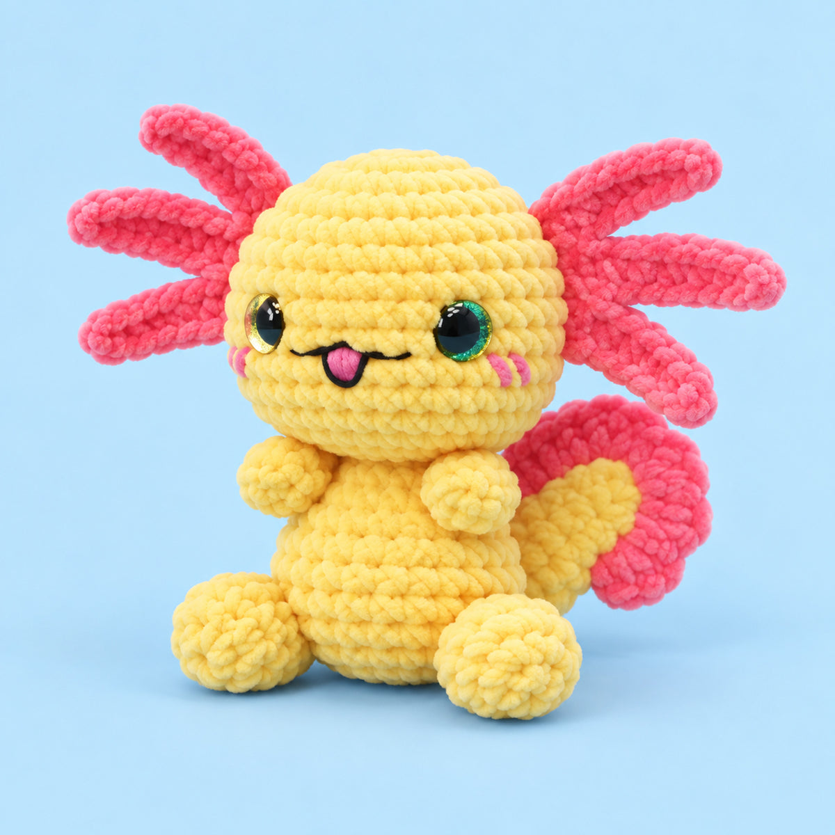 Sunbeam Axolotl: a yellow axolotl with pink gills and bright dark eyes