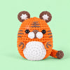 Tangerine Tiger: a bright orange tiger with dark stripes and rounded ears