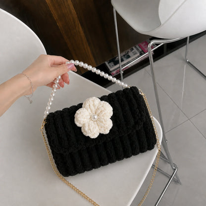 Flower Pearl Shoulder Bag, black with an ivory flower: finished bag close-up.
