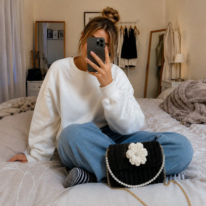 Flower Pearl Shoulder Bag, black with an ivory flower: bag styled with an outfit.